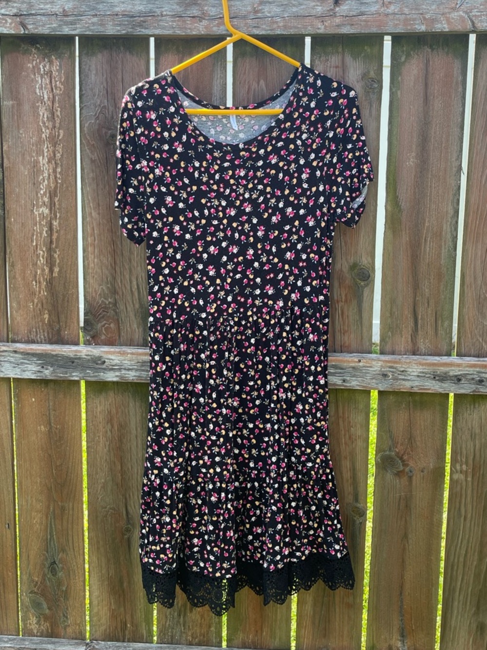 Black Floral Mini Dress with Lace Hem along bottom